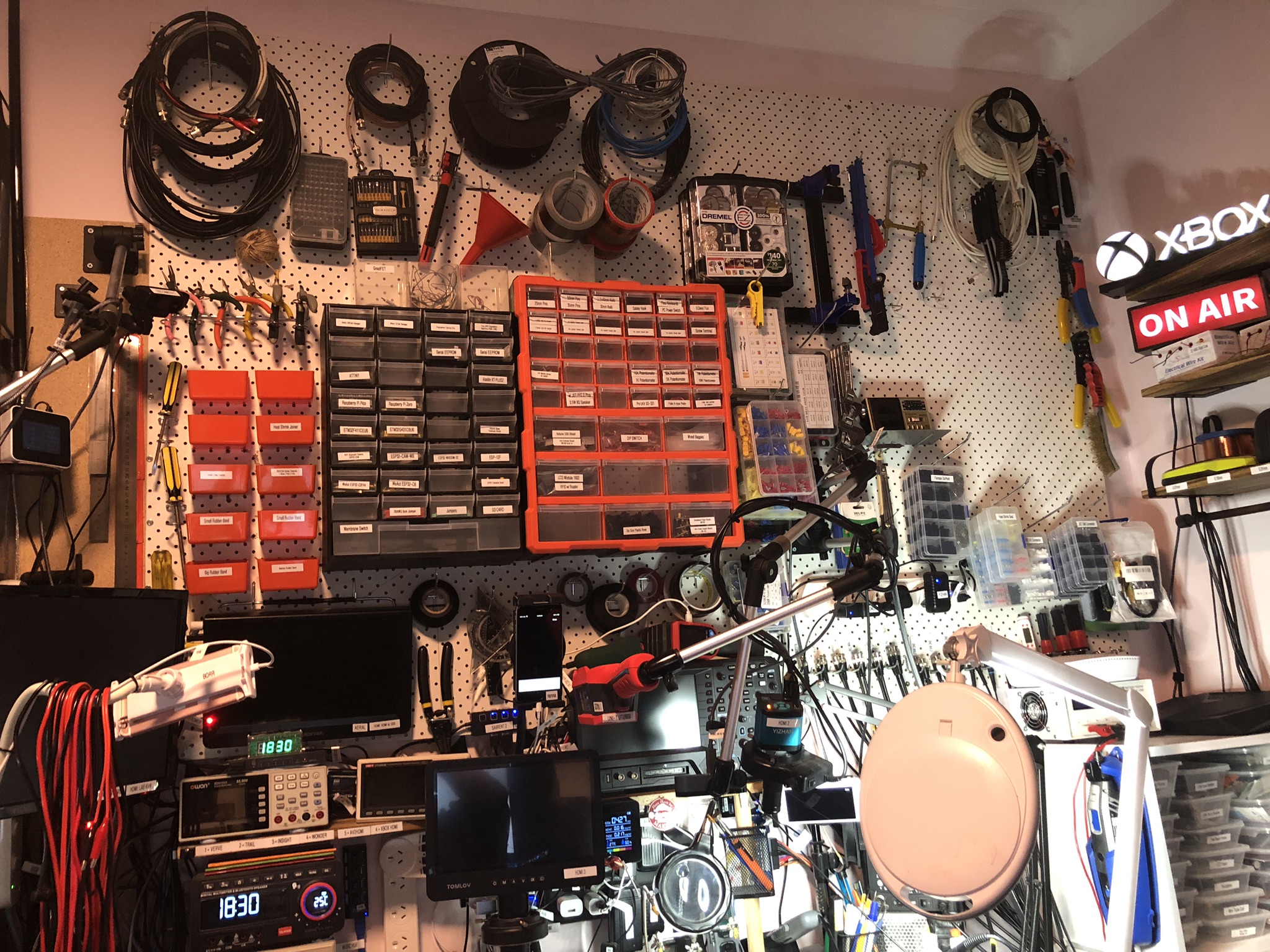 John's pegboard with tools and component drawers