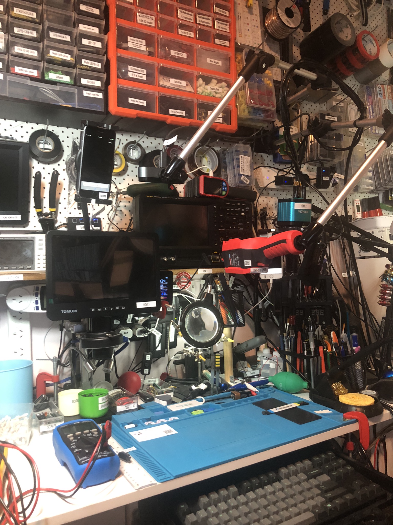 A photo of John's work bench with cameras in their new places