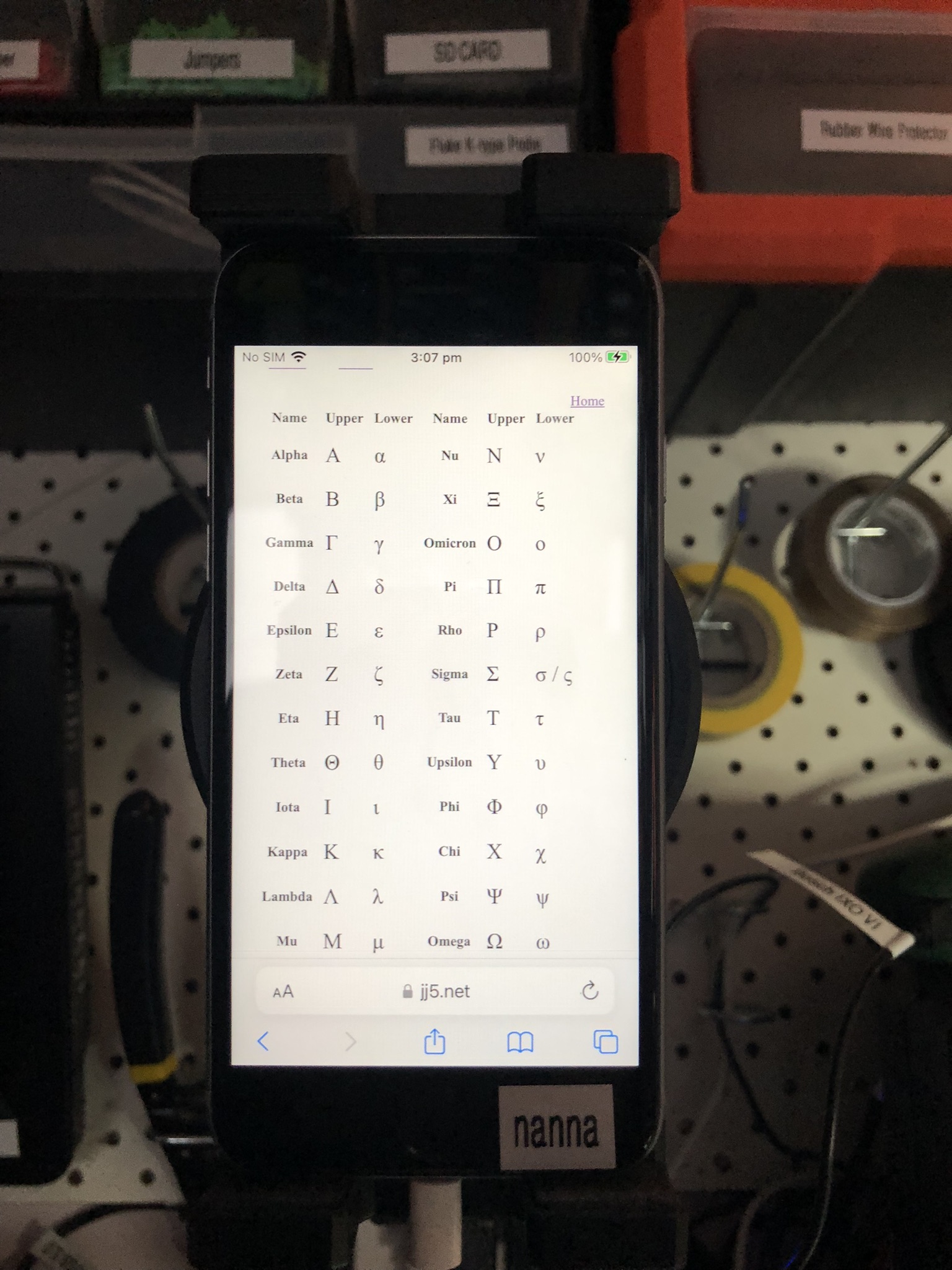 The Greek letters shown on an iPhone on the bench