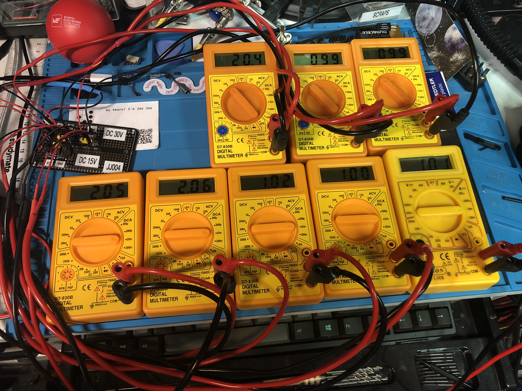 Five ammeters and three voltmeters connected to a voltage divider attached to a load